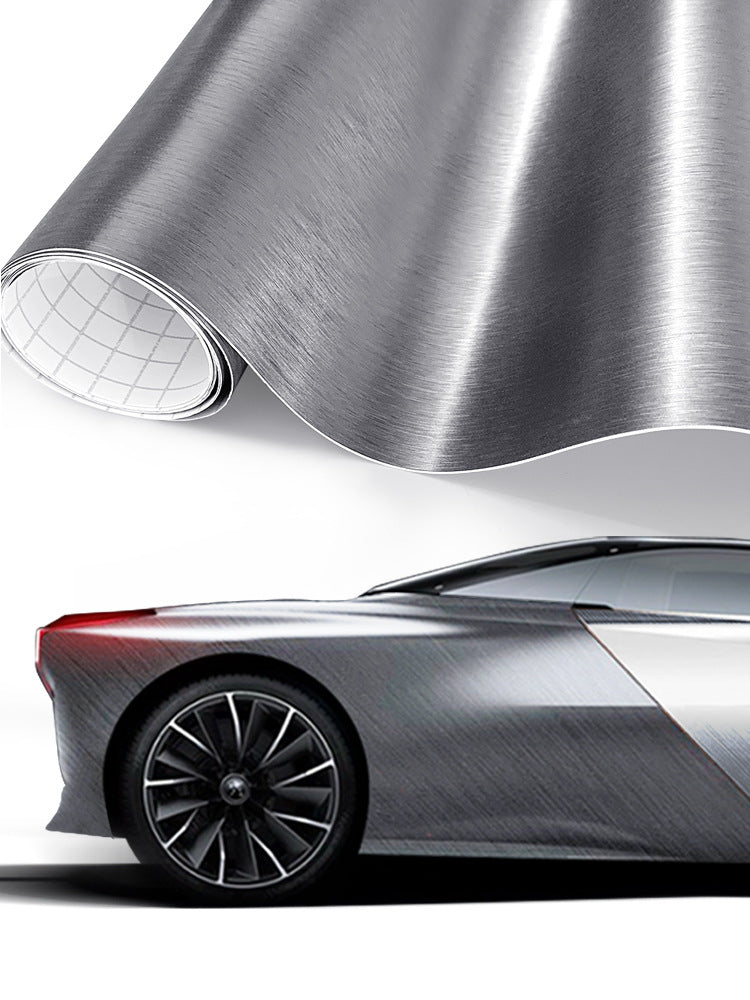 Brushed-metal style vinyl wrap film shown on a car (grey)
