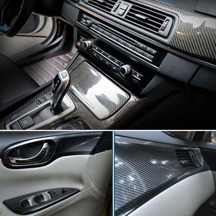 Carbon fiber vinyl wrap applied to car interior console, dash and door trim