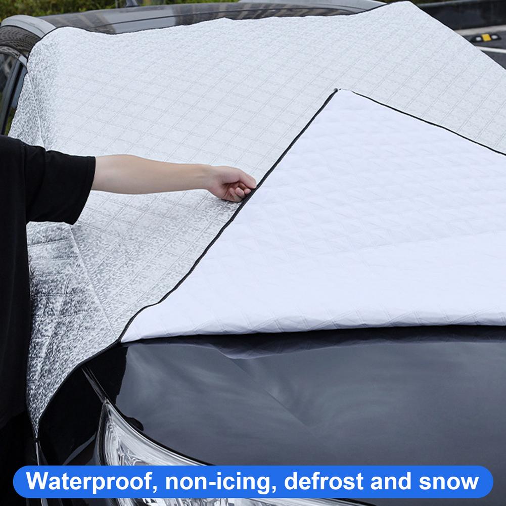 Close-up of quilted silver windshield snow cover waterproof lining