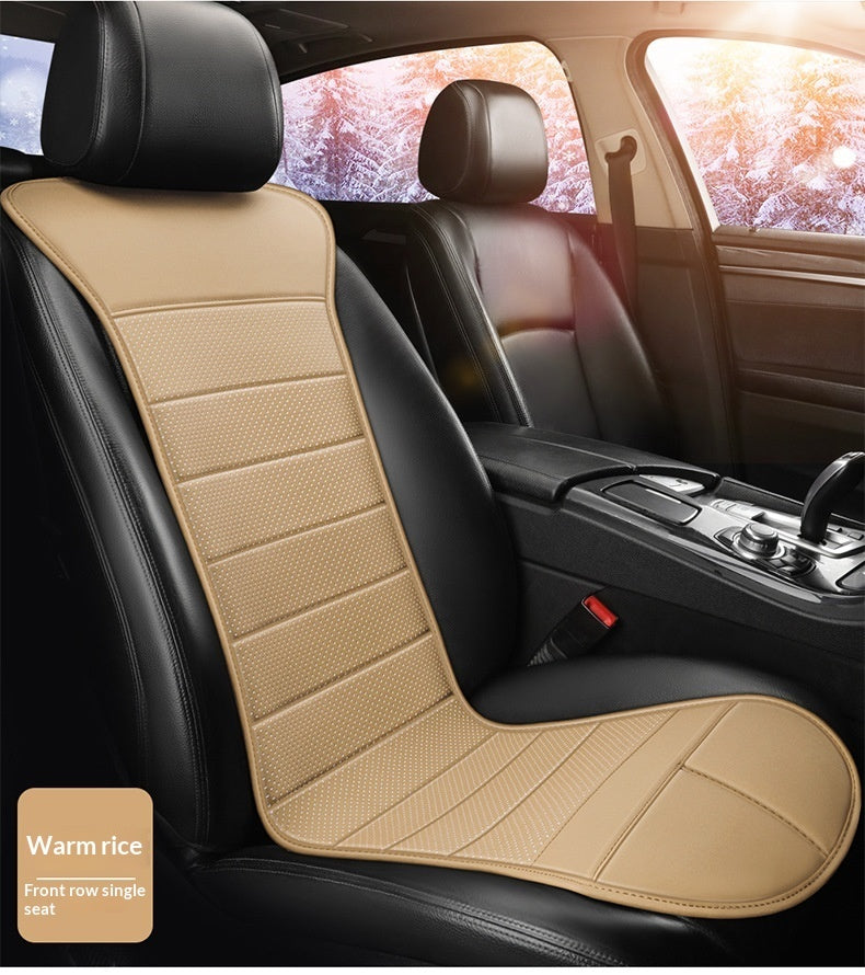 Warm beige heated car seat cushion on driver seat